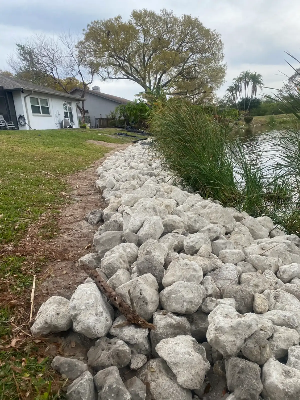 Decorative rock and gravel installation in a St. Petersburg FL landscape